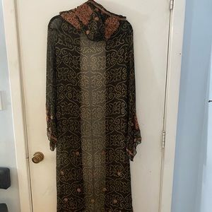 Beautiful hooded and beaded wrap